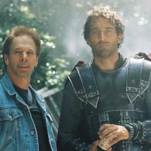 Producer Jerry Bruckheimer (left) speaks with Clive Owen (right) on location.