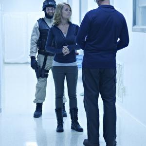 Still of Billy Campbell and Jeri Ryan in Helix (2014)