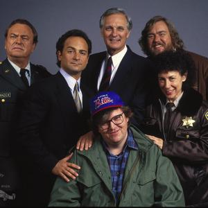 Still of Alan Alda John Candy Kevin Pollak Rip Torn Michael Moore and Rhea Perlman in Canadian Bacon 1995