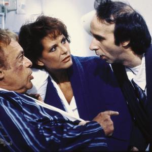 Still of Roberto Benigni, Claudia Cardinale and Herbert Lom in Son of the Pink Panther (1993)