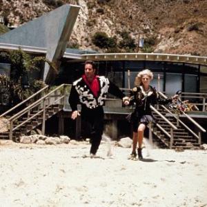 Still of Andrew Dice Clay and Maddie Corman in The Adventures of Ford Fairlane 1990