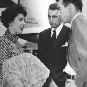 Elizabeth Taylor, brother Howard Taylor, and co-star Montgomery Clift at Idelwild Airport