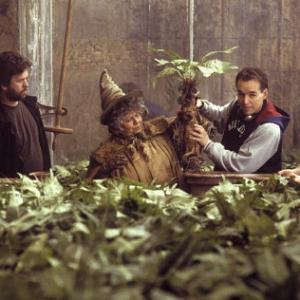 Director CHRIS COLUMBUS (right) and Professor Sprout (MIRIAM MARGOLYES) hold up a Mandrake.