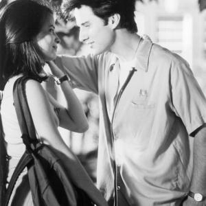 Still of Holly Marie Combs and Glenn Quinn in Dr Giggles 1992