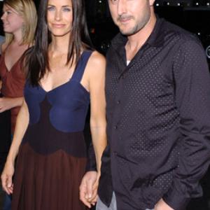 David Arquette and Courteney Cox at event of The Longest Yard 2005