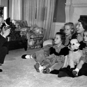 Joan Crawford at home in Los Angeles with her adopeted children Cindy, Cathy, Christopher and Christina C. 1949