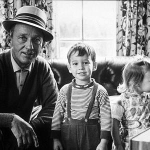 Bing Crosby with his son, Harry, and daughter, Mary Francis, at their Holmby Hills home, 1961.