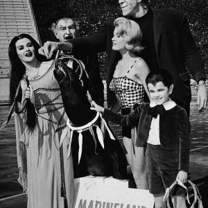 Still of Yvonne De Carlo Fred Gwynne Al Lewis Butch Patrick and Pat Priest in The Munsters 1964