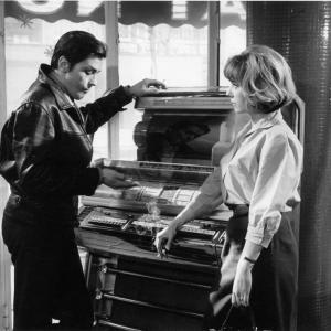Still of Alain Delon and Carla Marlier in Mélodie en sous-sol (1963)