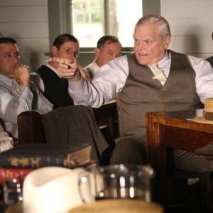 Clarence Darrow (Brian Dennehy) fires off a comment in defense of John T. Scopes (Jamie Kolacki) at the Scopes Monkey Trial.