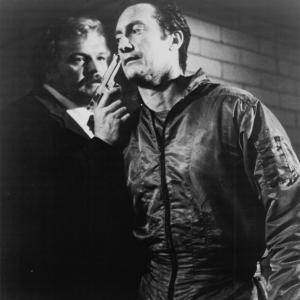 Still of Bryan Brown and Brian Dennehy in FX 1986