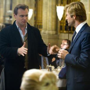 Still of Aaron Eckhart and Christopher Nolan in Tamsos riteris 2008