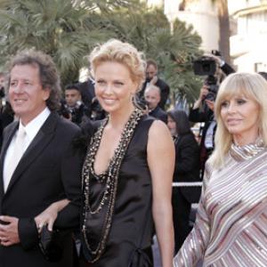 Charlize Theron Britt Ekland and Geoffrey Rush at event of The Life and Death of Peter Sellers 2004