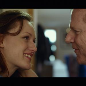 Still of Noah Emmerich and Kerry Bish in The Fitzgerald Family Christmas 2012