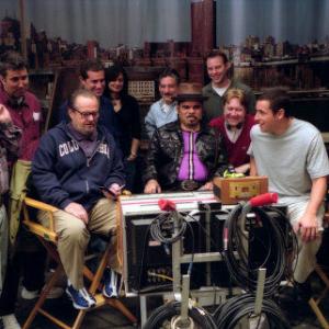 (center, l to r) Jack Nicholson, Luis Guzman and Adam Sandler view a scene replay on set.