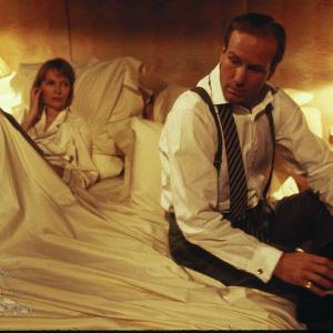 Still of William Hurt and Mia Farrow in Alice 1990