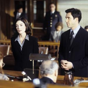 Still of Lara Flynn Boyle and Dylan McDermott in The Practice (1997)