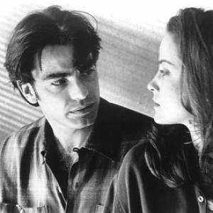 Still of Peter Gallagher and Alison Elliott in Underneath 1995
