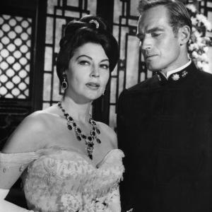 Still of Charlton Heston and Ava Gardner in 55 Days at Peking (1963)