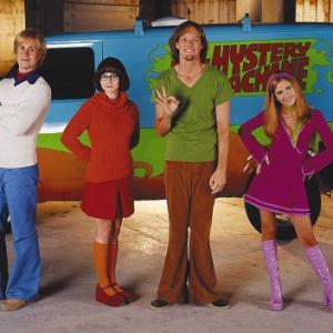 Fred Velma Shaggy and Daphne in front of the Mystery Machine