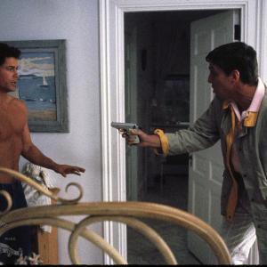 Still of Rob Lowe and John Glover in Masquerade 1988