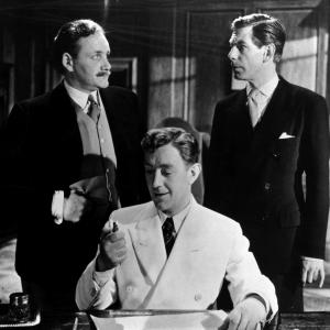 Still of Alec Guinness Michael Gough and Howard MarionCrawford in The Man in the White Suit 1951