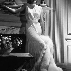 Jean Harlow standing in front of a fireplace 1936 Modern silver gelatin 14x11 estate stamped 600  1978 Ted Allan MPTV