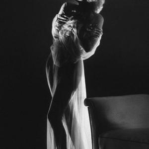 Jean Harlow standing semi-nude in a sheer gown, 1933. Modern silver gelatin, 14x11 unsgned, $600 Photo by George Hurrell / MPTV