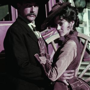 Still of Mark Harmon and Joanna Going in Wyatt Earp 1994