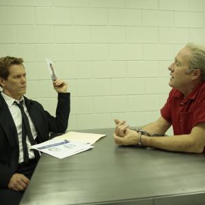 Still of Kevin Bacon and Gregg Henry in The Following (2013)