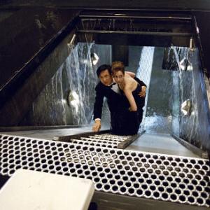 Still of Jackie Chan and Jennifer Love Hewitt in Smokingas (2002)