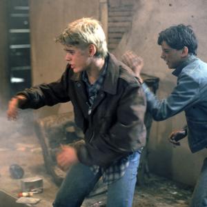 Still of C Thomas Howell and Ralph Macchio in The Outsiders 1983