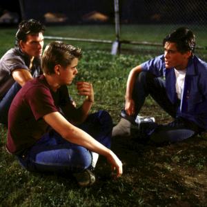 Still of Rob Lowe, Patrick Swayze and C. Thomas Howell in The Outsiders (1983)