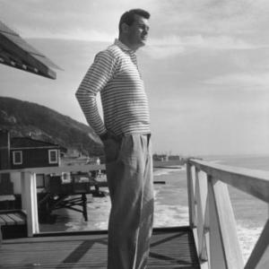 Rock Hudson at his Malibu beach home C 1960