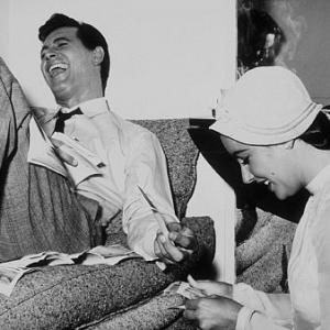 Elizabeth Taylor and Rock Hudson take a break from filming Giant