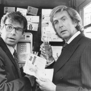 Still of Eric Idle and Rick Moranis in Splitting Heirs 1993