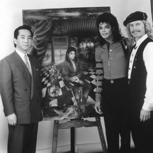 Hiromichi Saeki, Michael Jackson and Brett-Livingstone Strong unveiling a portrait of Michael Jackson, entitled 