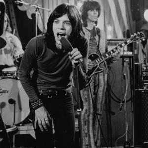 Still of Mick Jagger Keith Richards and The Rolling Stones in The Rolling Stones Rock and Roll Circus 1996
