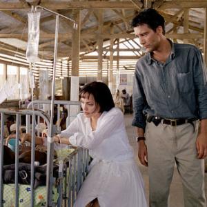 Still of Angelina Jolie and Clive Owen in Beyond Borders 2003