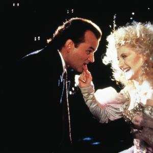 Still of Bill Murray and Carol Kane in Scrooged (1988)
