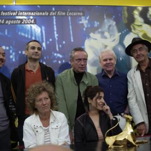 Olivier Assayas, Udo Kier, Tilde Corsi and Nelson Lik-wai Yu
