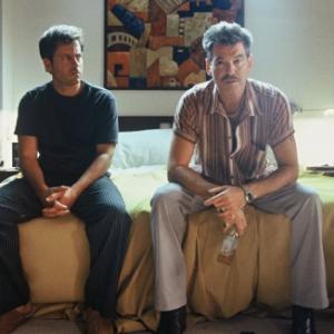 Still of Pierce Brosnan and Greg Kinnear in The Matador 2005