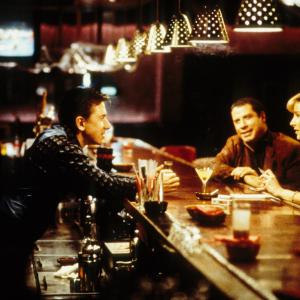Still of John Travolta Tim Roth and Lisa Kudrow in Lucky Numbers 2000