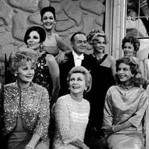 Bob Hope with Jerry Colonna and all of his leading ladies left to right Back row Joan Collins Dorothy Lamour Virginia Mayo Vera Miles Janis Paige front row Lucille Ball Joan Fontaine Hedy Lamarr and Signe Hasso circa 1961