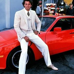 LORENZO LAMAS ON THE SET OF FALCON CREST WITH HIS PORSCHE 944  1983