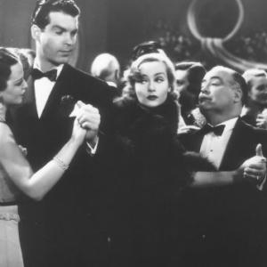 Still of Carole Lombard Dick Elliott and Fred MacMurray in The Princess Comes Across 1936