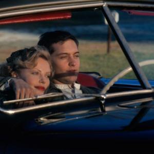 Still of Charlize Theron and Tobey Maguire in The Cider House Rules 1999