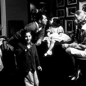 Dean Martin with his wife, Jeanne Beiggers, daughter, Gina, and son, Dino, at home in Brentwood, CA, 1961.