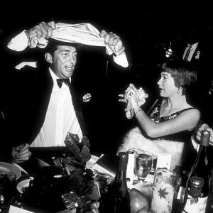 Dean Martin and Shirley Maclaine at Thailan Benefit thrown by Debbie Reynolds, c. 1960.