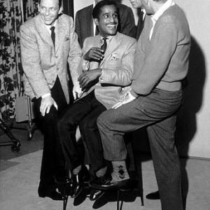 Sammy Davis Jr with Frank Sinatra Dean Martin Peter Lawford and Joey Bishop on the set of Oceans Eleven 1960